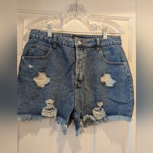 Pretty Little Thing distressed button fly denim shorts UK size 12 US size 8 NWOT